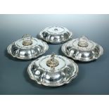 Four Victorian silver entrée dishes and covers, three bases possibly by Creswick & Co, Sheffield