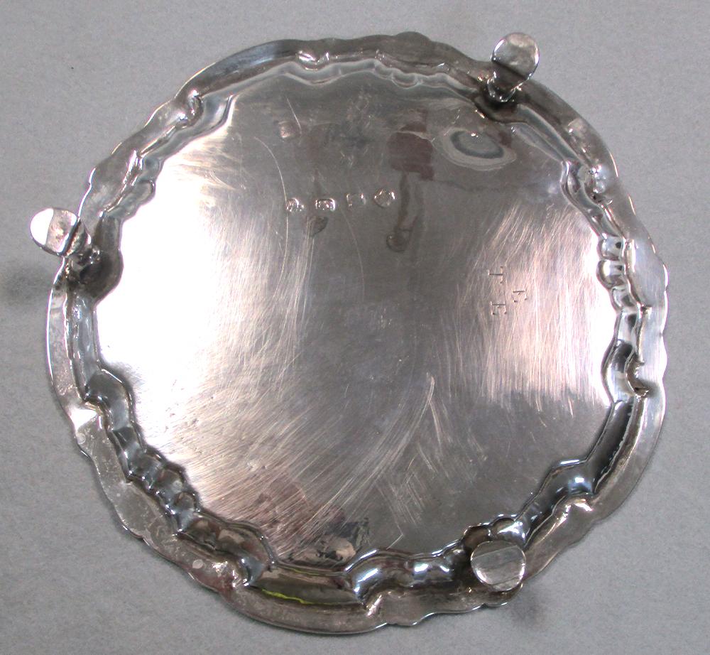 A George II silver waiter, by William Peaston, London 1747, with shell and scroll rim around the - Image 2 of 5