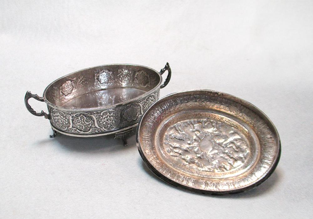 A Middle Eastern covered casket, of oval form, the sides heavily decorated with symmetrical - Image 2 of 7