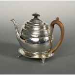 A George III silver teapot and stand, by Stephen Adams II, London 1801, of oval stepped form