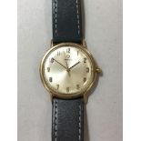 Omega - a gentleman's 9ct gold wristwatch, circa 1966, the circular signed cream coloured dial