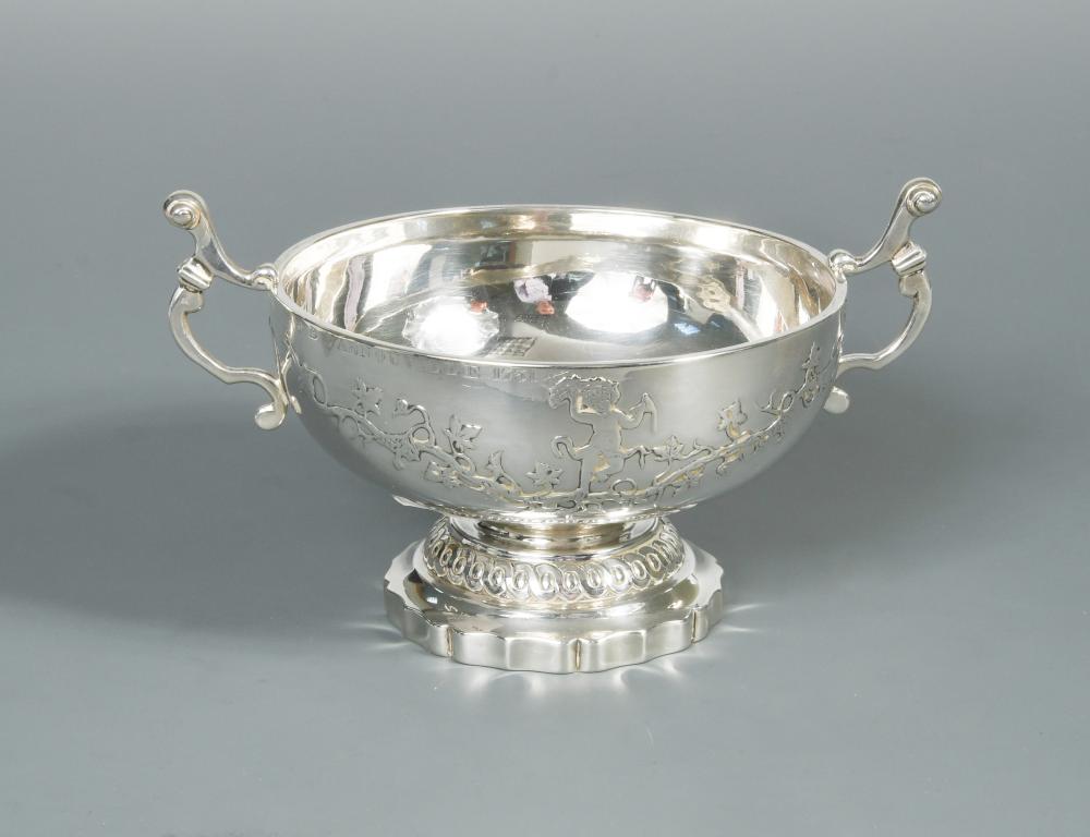 An 18th century French silver two handled wine bowl, maker's mark K.G, Paris 1750, of circular