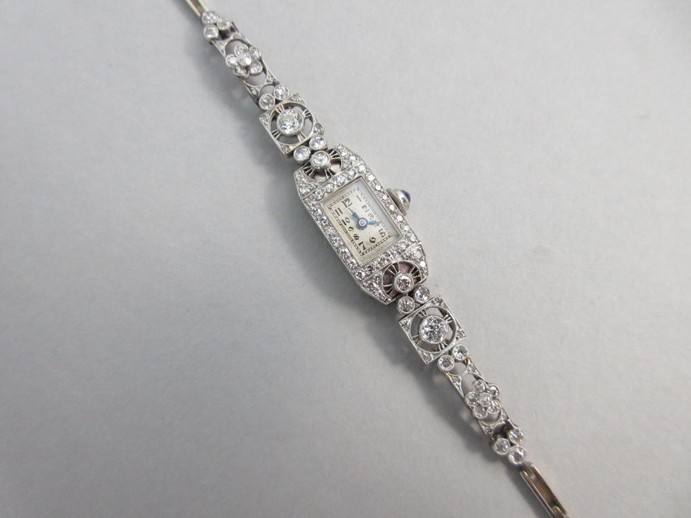 A diamond set cocktail watch with sapphire set crown circa 1930, the silvered rectangular dial - Image 7 of 7