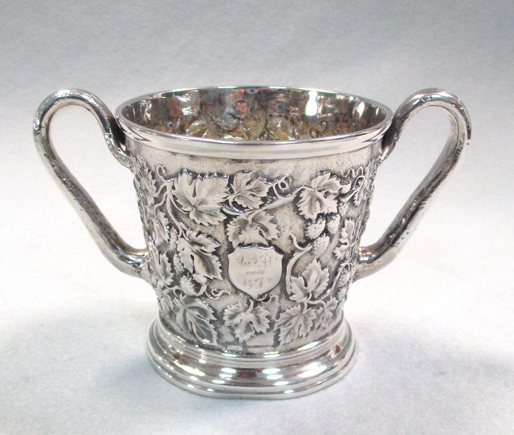 A Victorian silver two handled mug by John Samuel Hunt, London 1863, heavily embossed all over - Image 7 of 7