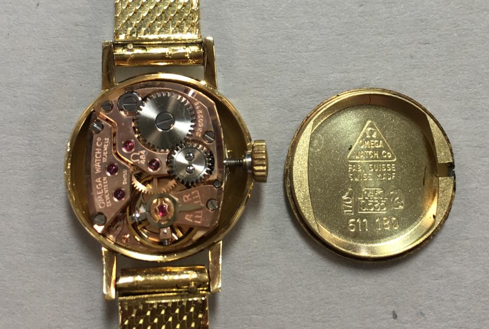 Omega - a lady's 14ct gold wristwatch, circa 1966, the circular signed dial with baton markers, - Image 2 of 2