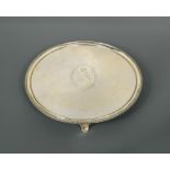 A George III silver salver, by Thomas Chawner, London 1785, the field engraved with an armorial