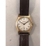 J.W. Benson - A lady's 9ct gold wristwatch, circa 1937, the 24mm circular signed cream dial with