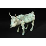 A Han dynasty bronze model of a buffalo, the muscular domesticated horned animal standing four