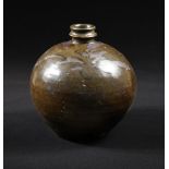 A northern Song dynasty Cizhou type ovoid jar, freely painted in sweeping strokes in russet slip