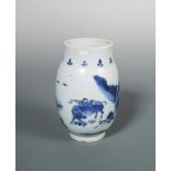 A Kangxi ovoid vase, painted with a boy playing a flute on the back of a buffalo by a waterfall,