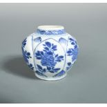 A Kangxi Jarlet with floral decoration, the leaf shaped moulded panels painted with flower stems,