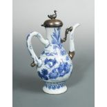 A transitional blue and white ewer, with later silver mounts and hinged lid, depicting a fisherman
