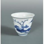 A Ming dynasty beaker with landscape decoration, the exterior painted with island scenes, 7cm high