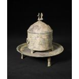 A bronze ritual cylindrical tripod wine container, cover and tray, Wen Jiu Zun and Pan, late eastern