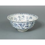 A Ming blue and white bowl, the interior decorated with a flower in the centre, a band of sanscrit