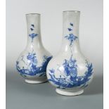 A pair of 19th century crackleware vases, painted with a monk and bats, 35cm high (2)