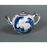 A Kangxi silver mounted blue and white tea pot and cover, the body painted with two rectangular