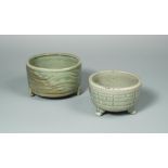 A late Yuan/early Ming Longquan celadon censer, of cylindrical form, with an inverted mouth rim, the