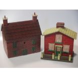 A 19th century Folk Art two-division tea caddy as a two-storey brick-built house, with painted