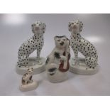 A pair of Victorian Staffordshire pottery seated dalmations, with gilt collars, 12cm high; a