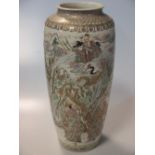 A Japanese earthenware vase, Meiji, circa 1900, decorated with immortals in a rocky landscape,