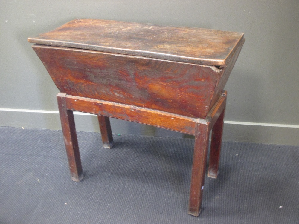 A 19th century elm dough bin on stand, 85 x 95 x 44cm