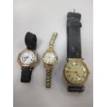 Three vintage wristwatches, two with 9ct gold cases on straps, one with an 18ct gold case on a