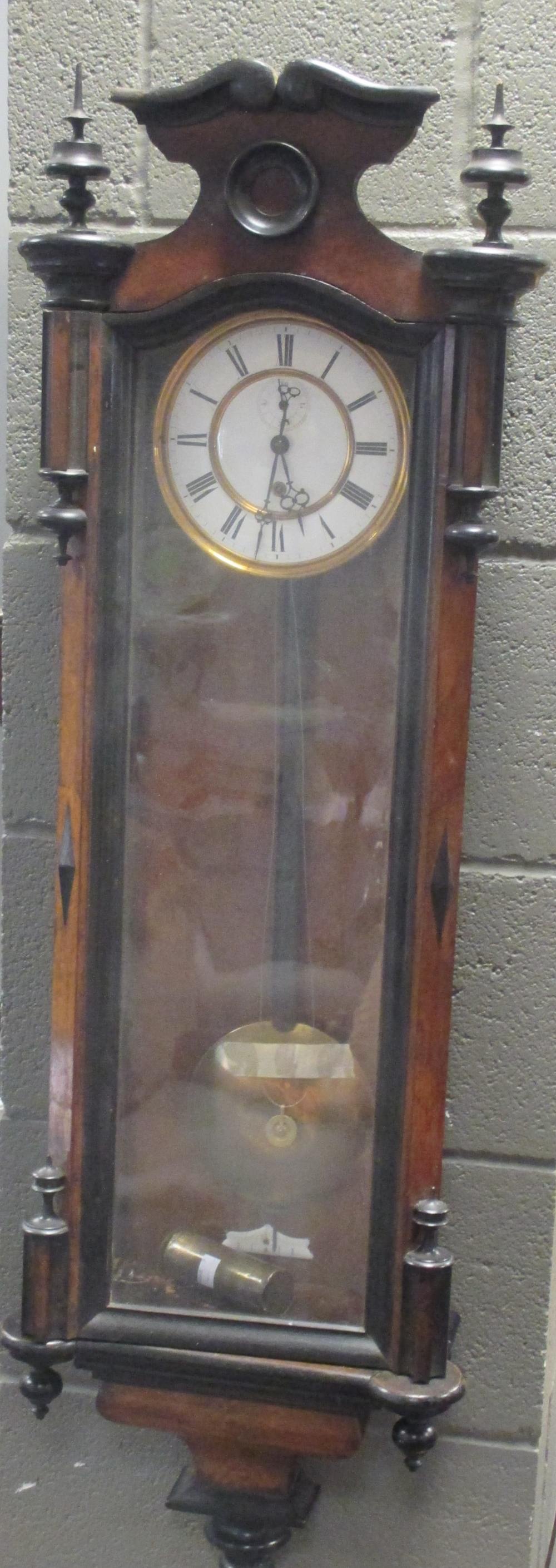 An early 20th century walnut cased Vienna regulator wall clock, 113cm long