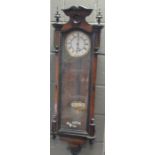 An early 20th century walnut cased Vienna regulator wall clock, 113cm long