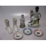 A group of 19th century pottery comprising three child's miniature dishes with printed "games" and