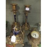 A late Victorian brass and ceramic japanesque style desk set to include a pair of candlesticks,