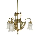 An Arts & Crafts brass pendant ceiling light, the three branches with pierced supports and