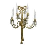 A pair of modern brass five branch wall lights, of classical design with ribbon bow and tassel