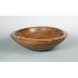 A large 19th century sycamore dough bowl, of circular form with banded decoration, attractively