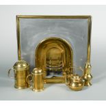 A Victorian brass model of an arched fireplace, together with a miniature fire curb, a set of