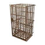 A French iron work wine cage, 107 x 55 x 53cm (42 x 21 x 21in)