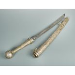 A late 19th or early 20th century Thia Dha sword, with floral worked silver scabbard and ball hilt
