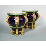A pair of Minton majolica jardinieres, circa 1870, the blue ground baluster bodies with six