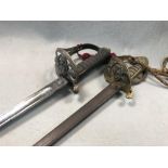 A Victorian officer's Naval pipe back sword, with shagreen grip and gilt lion's head pommel,