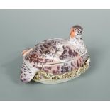 A rare Chelsea porcelain partridge tureen and cover, circa 1755, naturalistically modelled with