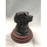 A 19th century bronze inkwell cast as a hound's head, mounted on a rouge marble base 12cm (5in)