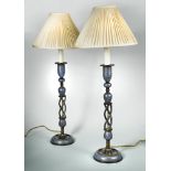 A pair of Kashmiri lacquered table lamps, with pierced and twisted columns, the whole with blue