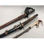 A Second World War military issue Japanese Katana, together with a Victorian officer's sword, the