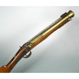 A percussion blunderbuss, the brass flared end barrel stamped London, with spring bayonet, brass