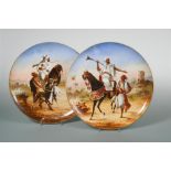 A pair of French pottery charges by Lebeuf, Milliet of Creil and Montereau, circa 1845, painted by