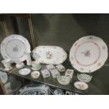 A collection of Herend porcelain to include miniature two handled baskets, matchbox holders etc