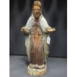 A Continental painted wood eccesliastical figure, 50cm high