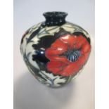 A Moorcroft vase, 18cm high