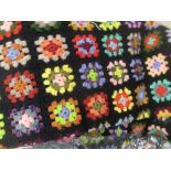 Two multi-coloured crochet bedcovers