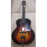 A Broadway Harmony H954 acoustic guitar, arched top model with sunburst effect and case
